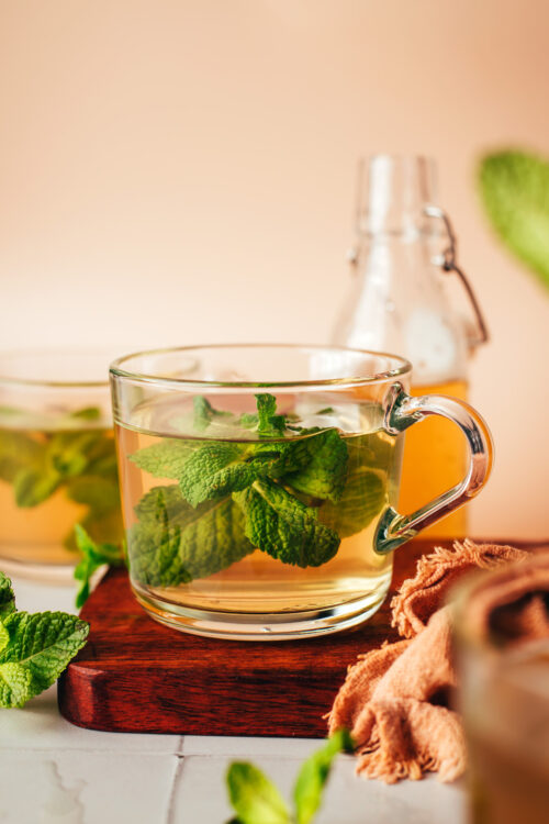 Clear glass mugs filled with homemade fresh mint tea